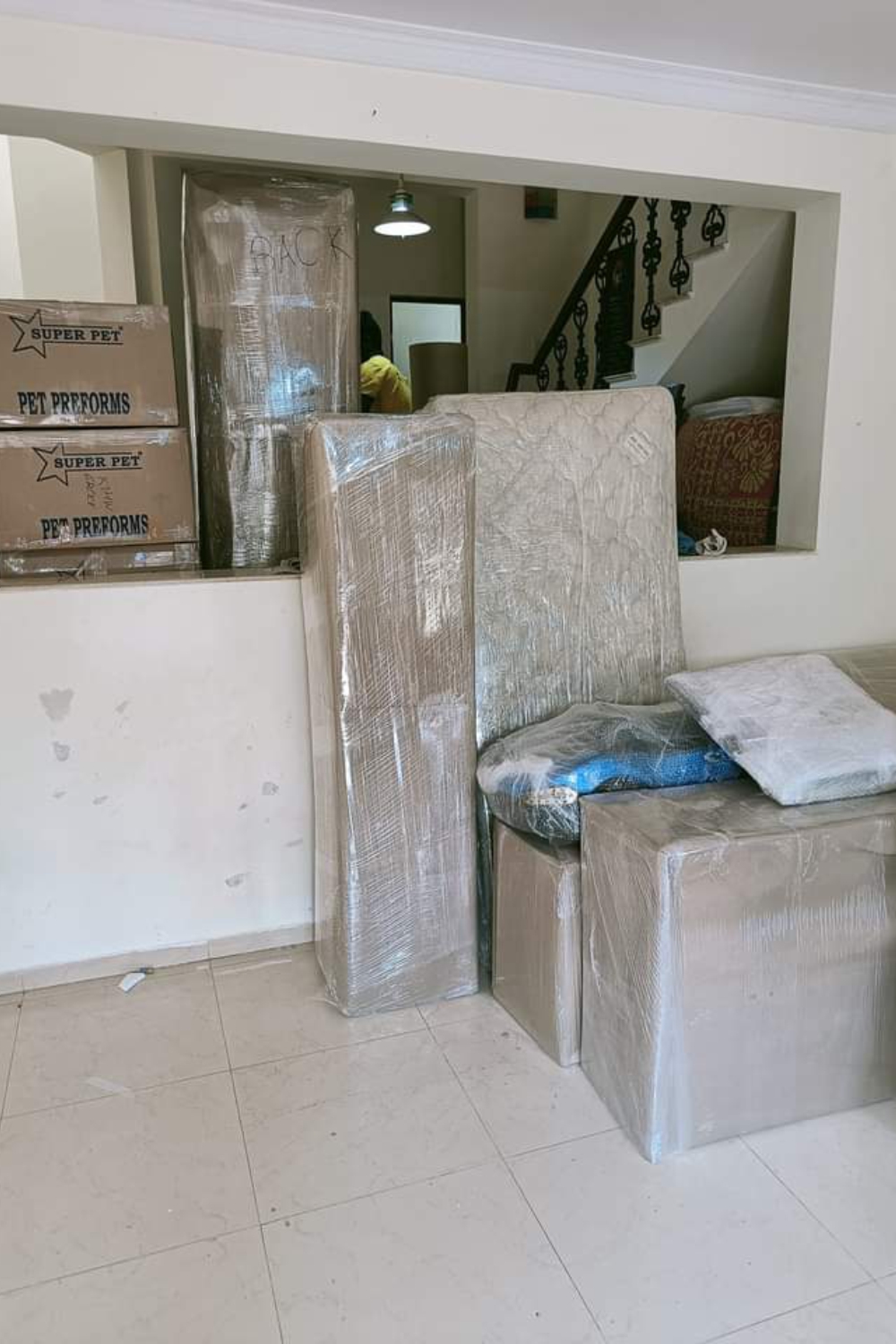 Couple unloading truck